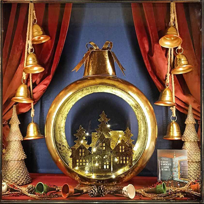 The large sphere with the golden village